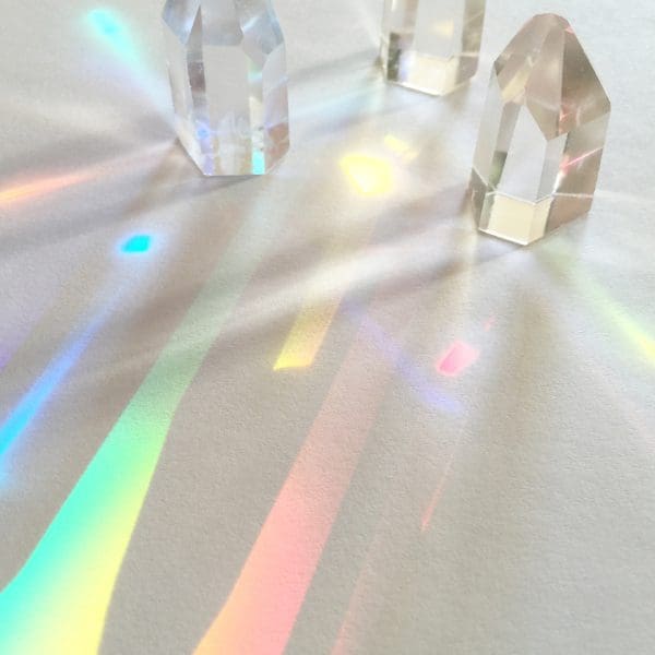 Prisms with light diffraction of spectrum colors